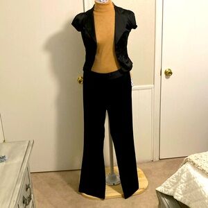 Like new black satin pant suit. Jacket wears liked bolero.